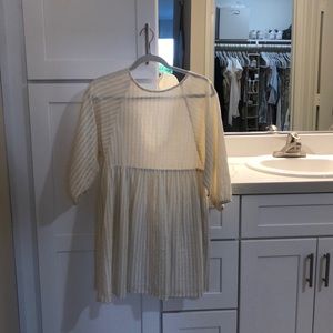 high neck mini dress with 3/4 sleeves & tie back